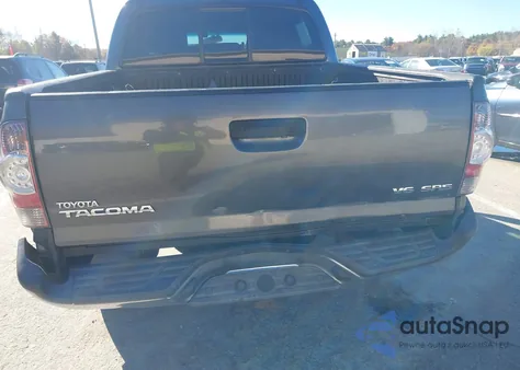 2015 Toyota Tacoma Base V6 z USA, uszkodzony, nr VIN 3TMLU4EN5FM197170